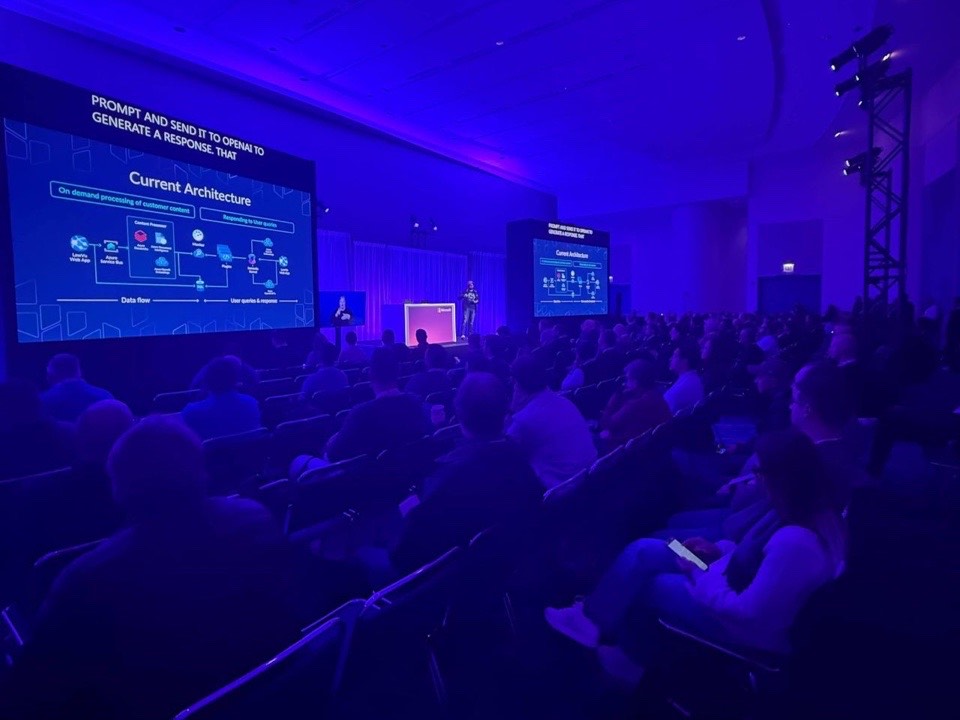 Suhel Mangera presenting to an audience at Microsoft Ignite.